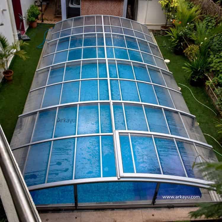 arkayu swimming pools retractable roof enclosure for a home in India