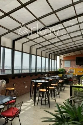Arkayu patio retractable enclosure for rooftop restaurant in Bengaluru, India 14